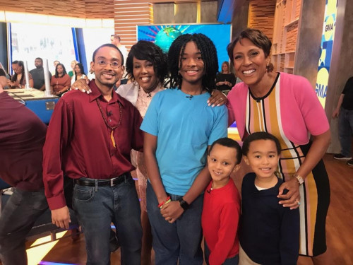 Jamil Rivers attends a Good Morning America show segment for an interview with Robin Roberts. She is pictured with her husband, Ricky, and sons, Tre, Joshua and Michael.