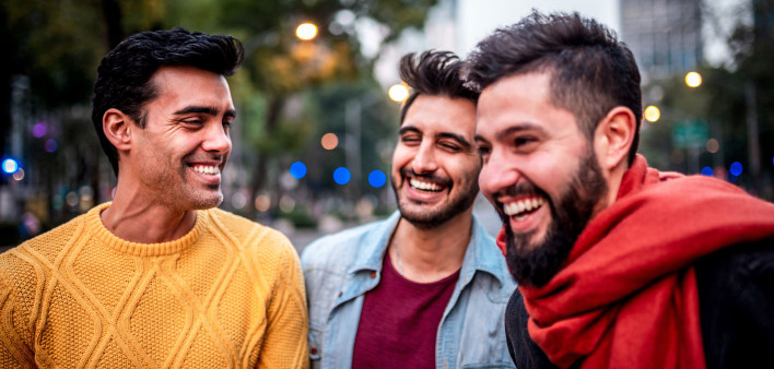three friends young men laughing fun