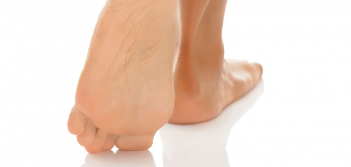 woman's bare legs and feet