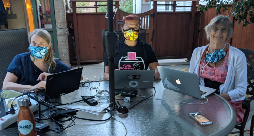 Members of Vote Positive Colorado do outreach via phone banking