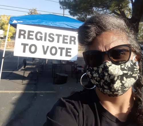 Shannon Robinson of Vote Positive Colorado registers new voters.