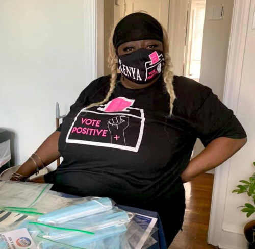 Kenya Moussa of Vote Positive PA puts together informational packets for voters