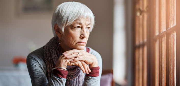Shot of a senior woman looking thoughtful in a retirement home