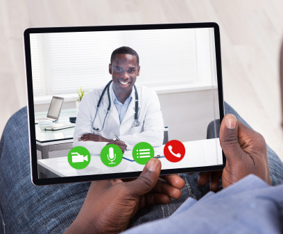 Close-up Of African Person Holding Blank Digital Tablet