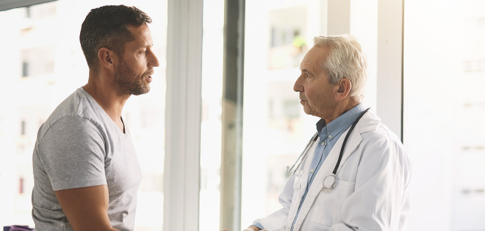 Cropped shot of a senior doctor giving his male patient a thorough checkup during his consultation