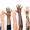 different race hands reaching upward