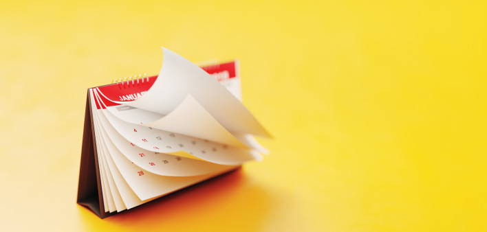red calendar on yellow background