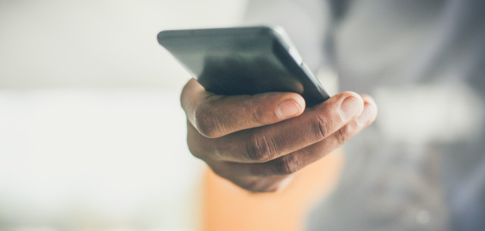 hand holding smart phone