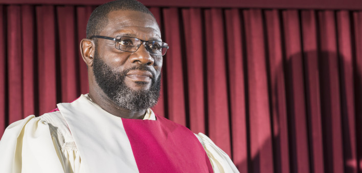 Mature black man in church choir