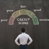 man looking at blackboard credit score