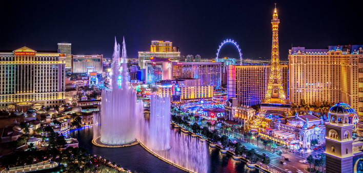 Panoramic view of Las Vegas strip at night in Nevada. The famous Las Vegas Strip with the Bellagio Fountain.