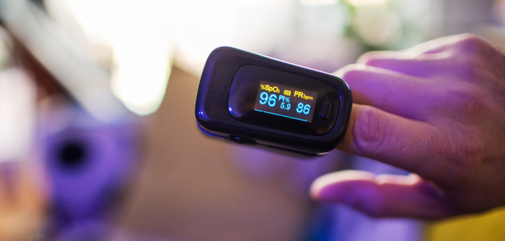 Oximeter for checking oxygen saturation in blood on male hand