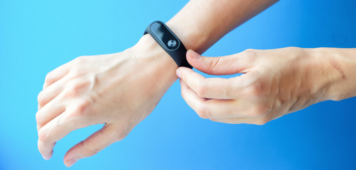 Woman hand with fitness tracker