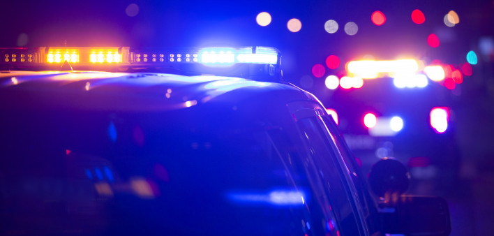 Police units responds to the scene of an emergency. police car police lights