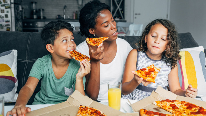 family eating pizza