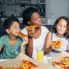 family eating pizza