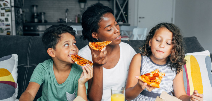 family eating pizza