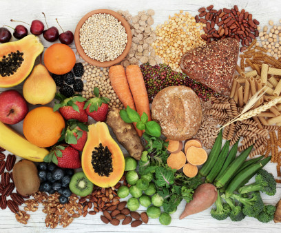 food with high fiber content for a healthy diet with fruit, vegetables, whole wheat bread, pasta, nuts, legumes, grains and cereals