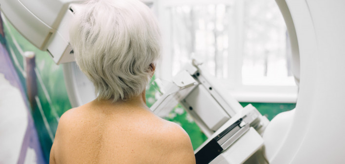 Senior woman having a mammography scan at hospital