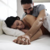 Latino couple in bed