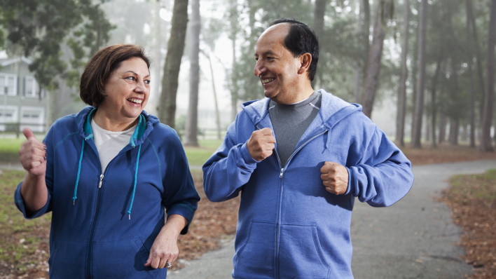 Latino couple jogging