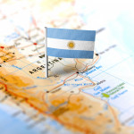 The flag of Argentina pinned on the map.
