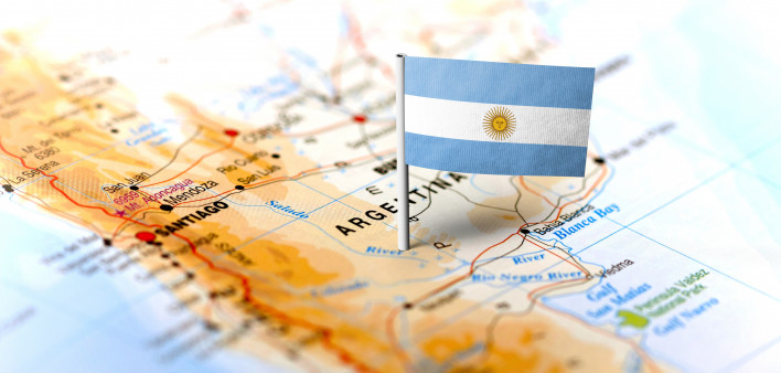 The flag of Argentina pinned on the map.