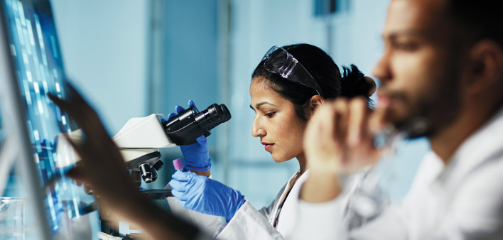 researchers working in the lab