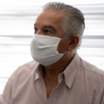Patient in a medical consult wearing face mask