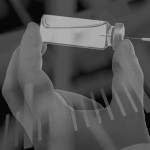 illustration black and white clock hand with vaccine syringe