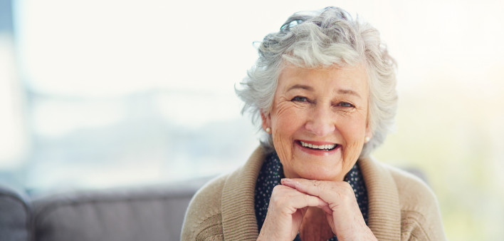 older gray haired woman smiling