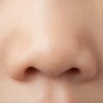 A little girl's nose close-up