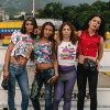 Michell Lopez, Estrella Fuentes, Ruby Diaz and Michelle Quiroz stand at the center of Simón Bolívar International Bridge on the Venezuelan-Colombia border.