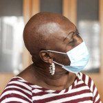 Health visitor and a senior woman during nursing home visit