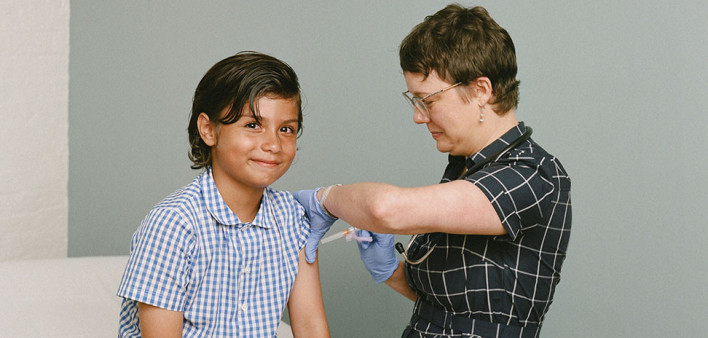 boy receives a vaccine