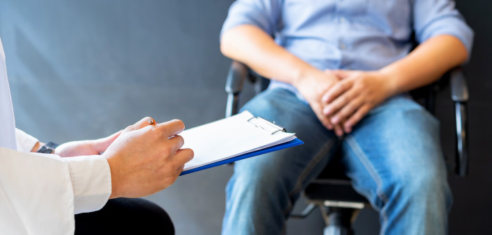 Male doctor and prostate cancer patient are discussing about prostate cancer test report. Diagnostic, prevention of men diseases,