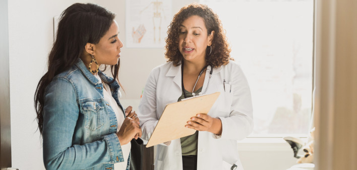 doctor and patient review treatment plan