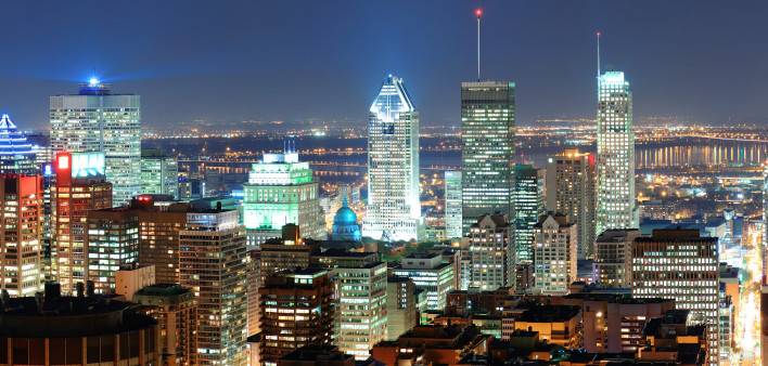 Montreal at dusk panorama with urban skyscrapers viewed from Mont Royal