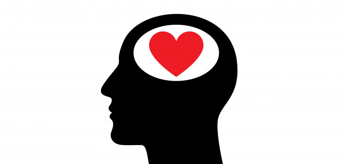 illustration ofheart in the head of mans silhouette