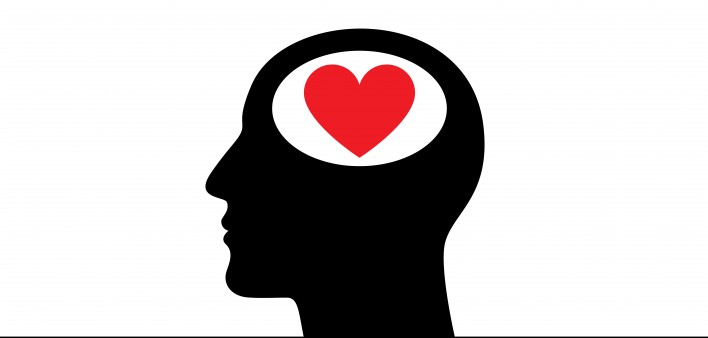 illustration ofheart in the head of mans silhouette