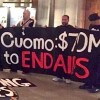 Activists occupy the “War Room” of the N.Y. Capitol to ensure the state budget includes $70 million to end AIDS.