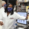 President Joe Biden speaks with Kizzmekia Corbett, PhD, the lead COVID-19 vaccine scientist, during his visit to the U.S. National Institutes of Health.