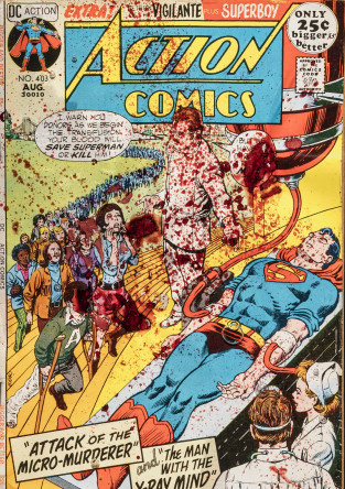 Untitled (detail), 2018, original 1971 Action Comics, used blood collection bag with needle, residual blood of gay man on PrEP; plexiglass, UV resin