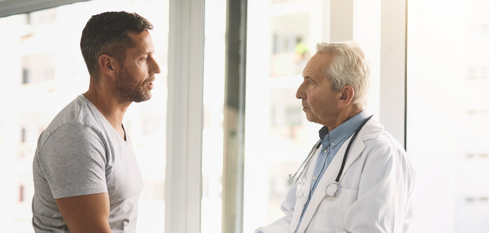 Cropped shot of a senior doctor giving his male patient a thorough checkup during his consultation