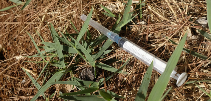 Abandoned syringe on the street