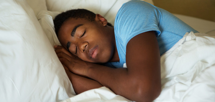 Teenage Boy Sleeping in bed