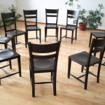 chairs arranged in a circle support group aa meeting