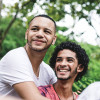 Gay friends having a good time at public park