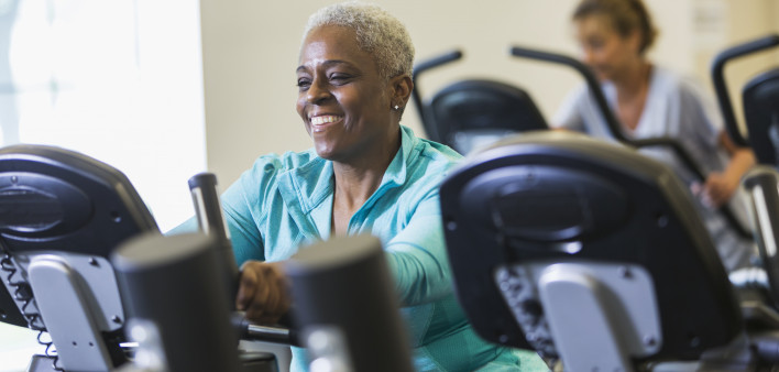 older woman on exercise bike
