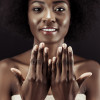Beautiful african american woman showing her nails